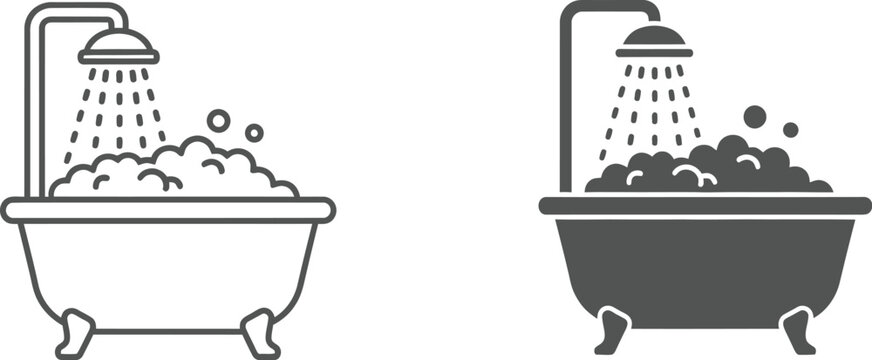 Vintage clawfoot bathtub overflowing with soap suds and water from an overhead shower head shows bathing luxury.