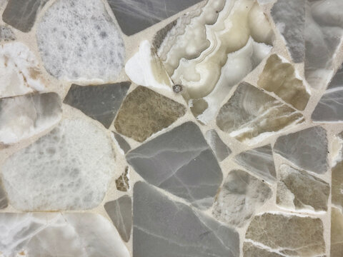 Close up of random cut marble stone texture in abstract pattern. Suitable for marble wall art. Minerals texture. Seamless background.