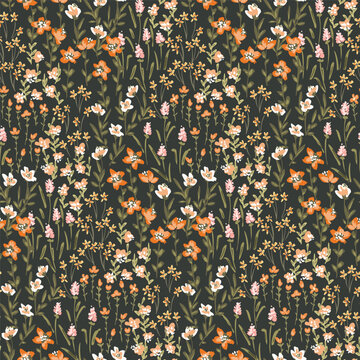 Cute hand painted colorful ditsy florals as a maximalist millefleurs garden design in colors of orange, yellow, white, pink and green on black. Botanical seamless vector pattern. Great for home decor.