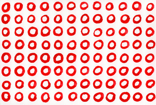 Red painted watercolor rings in abstract handmade dot pattern art