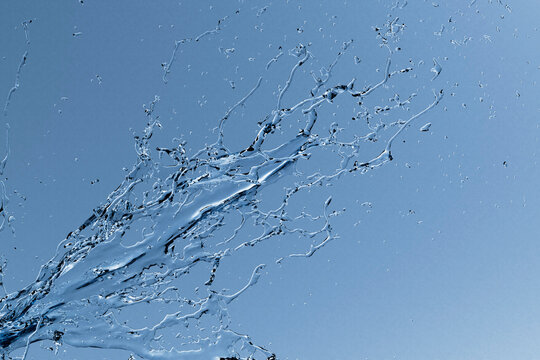 Abstract blue water splash in motion with 3d fluid flow