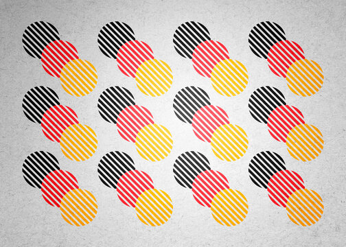 Abstract illustration of striped circles in a German flag color pattern