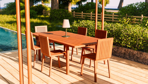 Wooden outdoor dining set by pool in tranquil summer garden