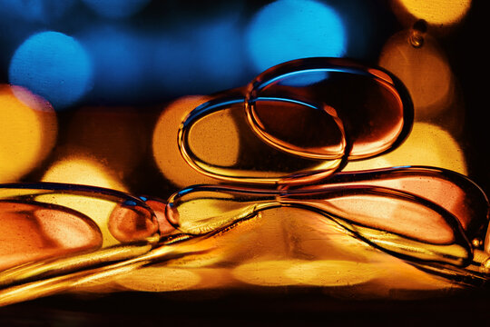 Abstract colorful liquid bubbles with vibrant blurred background