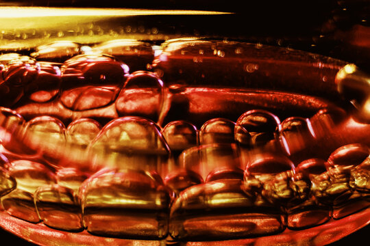 Abstract colorful macro of bubbles in liquid with vivid colors