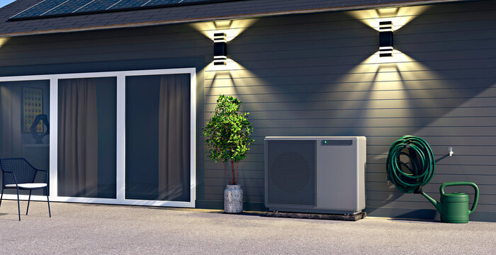 Modern private house with heat pump outdoors showing sustainability