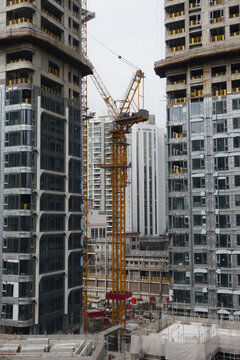 Vertical image of the construction process of a multi-story building