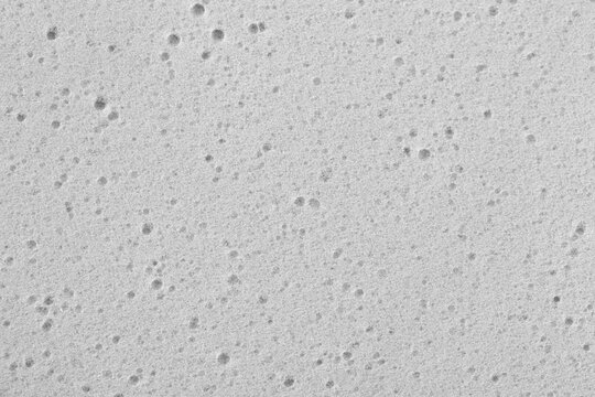gray porous foam sponge macro texture background