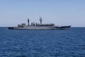 Obraz premium Navy frigate sail on the smooth sea during mission of protect and rescue in mediterranean sea.