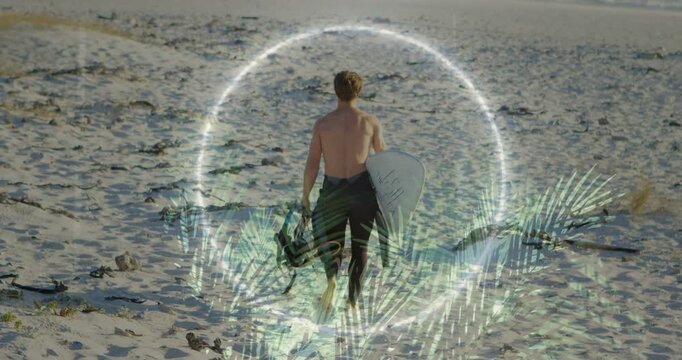 Surfer walking to shore carrying board,scooter motion causing palm-halo ring circling legs surfing