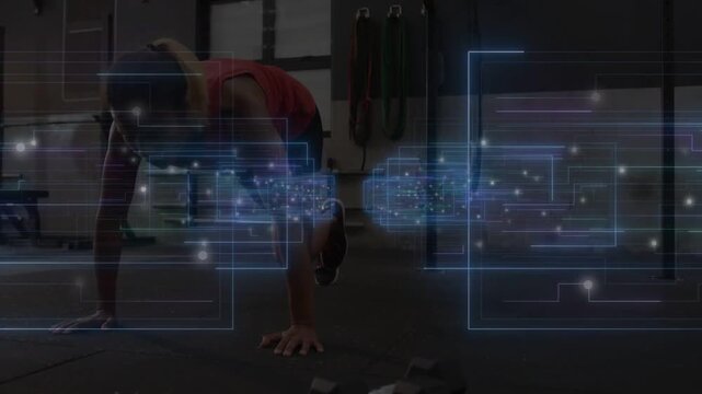 Woman alternating knee drives from plank in gym, building core while blue HUD tracking midline