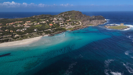Fototapeta premium Aerial drone view of calm crystal clear water at La Pelosa beach, Stintino, Sardinia, empty seaside landscape with no people