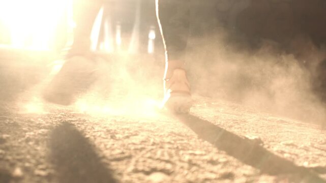 Shot A young woman exercises under an urban bridge, her athletic sneakers stirring dust, emphasizing dynamic city life and an active lifestyle.