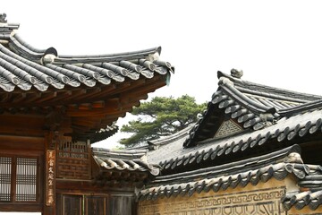 Obraz premium Layered Giwa Roofs and Traditional Korean Wall Patterns at Gyeongbokgung Palace, Seoul