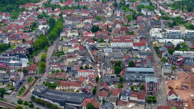 An aerial view around the old town in the city Merzig in the country of Germany on a cloudy spring afternoon .