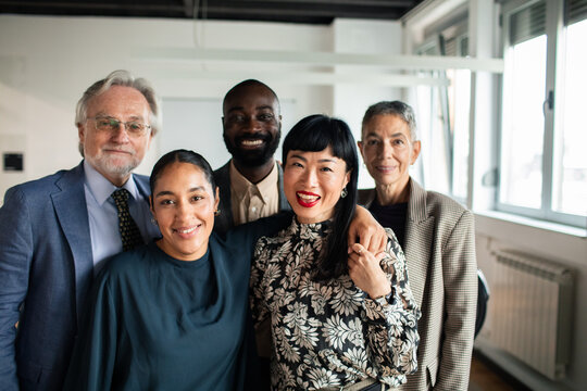 Multigenerational diverse business team portrait in modern office
