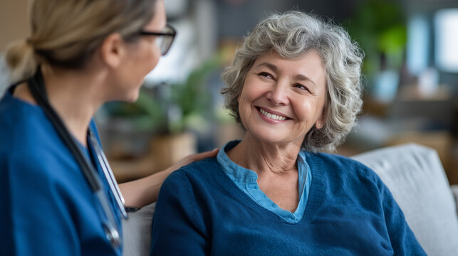 Palliative care physician having goals-of-care conversation with elderly patient in sunlit hospice room, mutual respect visible, patient autonomy centered, dignified healthcare par