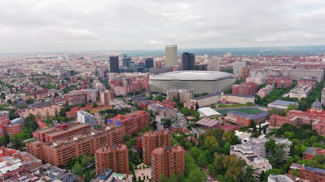 MADRID,SPAIN: Aerial view of the iconic Bernab&eacute;u football stadium, home of Real Madrid with its striking modern exterior, ideal for travel, sports or city footage.