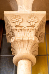 Carved stone column capital with floral rosette relief © GPH-Foto.de
