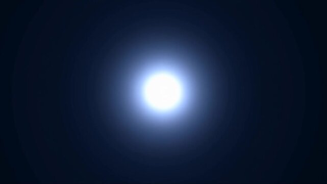 Bright glowing light source in a dark background. Represents illumination, inspiration, and the essence of creativity