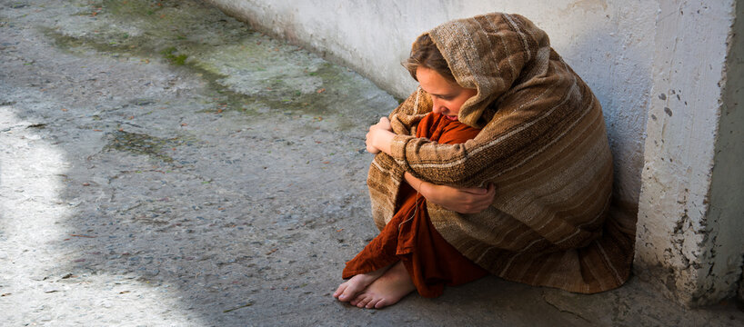 Frozen girl sitting on the floor