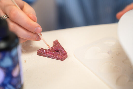 A master class on making jewelry from epoxy resin. Close-up