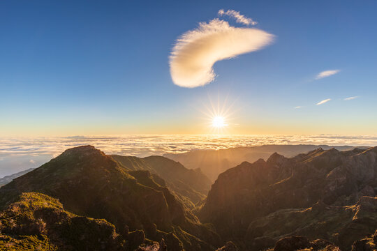 Sunrise over Pico Ruivo mountains with dramatic cloud in Madeira