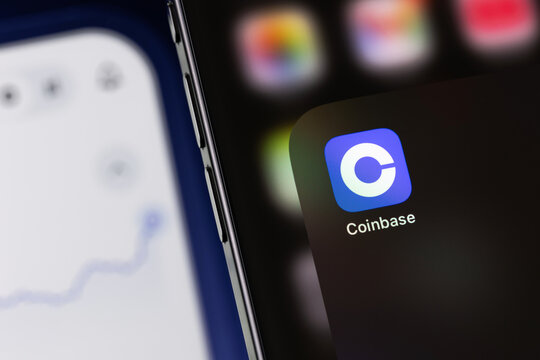Coinbase mobile icon app on a screen smartphone iPhone closeup. Coinbase is a digital currency exchange. Batumi, Georgia - February 20, 2026