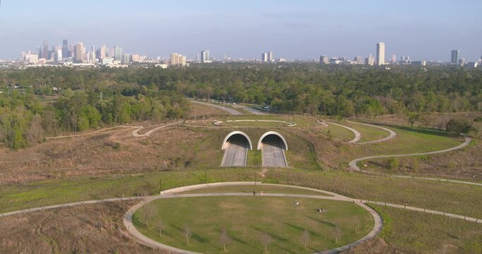 Drone Shot of Memorial City Houston car tunnels through urban park