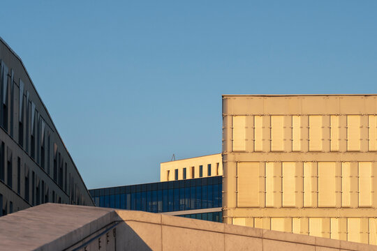 Modern office building architecture with minimal urban lines under open sky creating abstract structure geometry and clean copy space background
