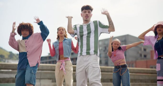 Happy, outdoor and dancing with people in city for hip hop, choreography and performance together. Creative crew, artist and friends with exercise in group for flash mob, energy and celebration