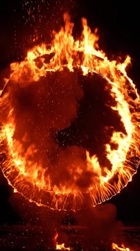 A massive fireball engulfs a globe at night, symbolizing destruction and chaos