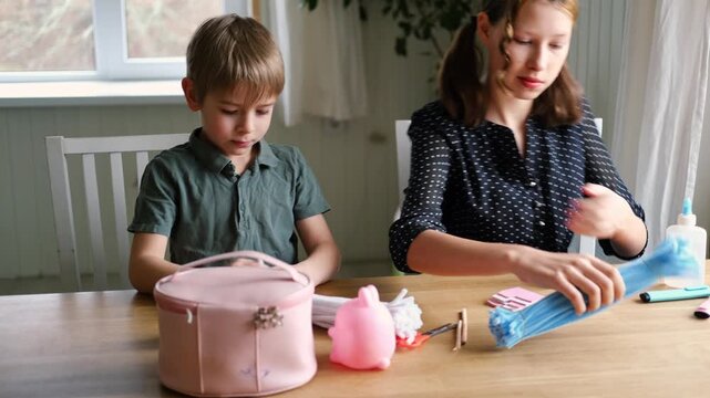 Happy Children Laugh and Fun Make DIY Toys. Kids Crafting from Fluffy wire, Bending Plush. Craft Pipe Cleaners. Leisure on Holidays. Thick Fluffy Chenille Stems for Arts. Supplies, Chenille Stems.