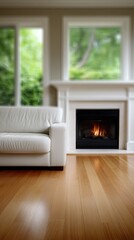 Fototapeta premium Living room with a sofa and fireplace shows farmhouse style. The background is blurred, creating a warm and inviting space