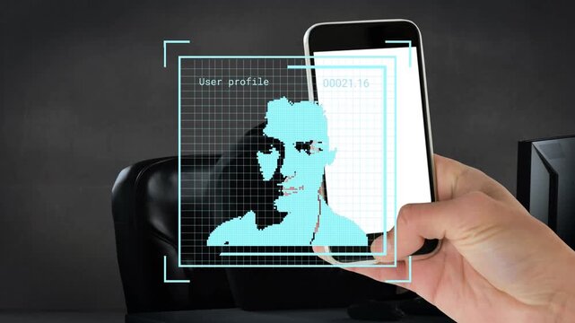 Multiple profile icons and hand holding a smartphone against caucasian male hacker using a computer