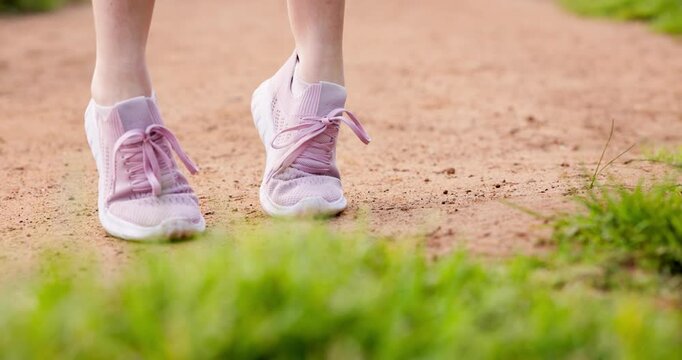 Hands, outside and woman with shoelace for fitness, running and walking for health. Female person, closeup and preparing in training shoes with jogging, exercise and workout for wellness or self care