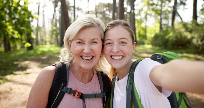 Tongue out, people and face with selfie for hiking, memory and profile picture for social media. Nature, senior mom and adult daughter with photography for bonding, smile and women for fitness