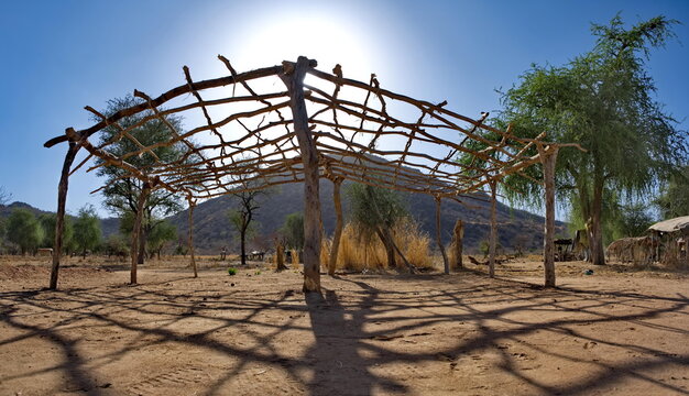 Central Africa, Chad, Mongo. Panorama of the wooden base of a nomadic tribal dwelling in the harsh sunlight at sunset.