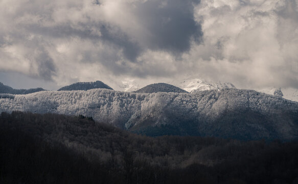Winter landscape with frost covered trees in the mountains. Ariege Pyrenees France