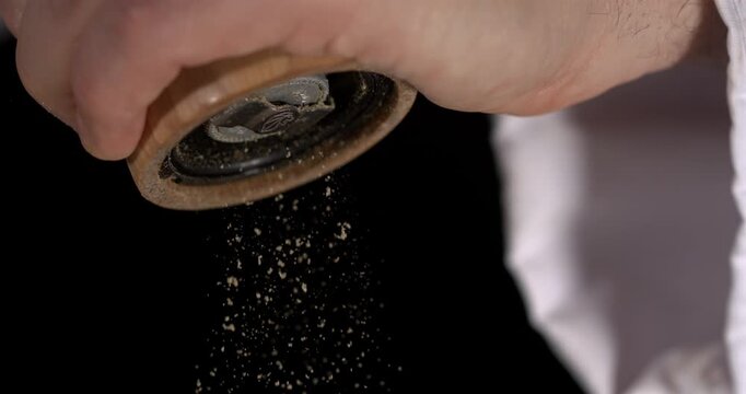 Super slow motion, Chef Seasoning With Wooden Pepper Grinder White Sleeve
