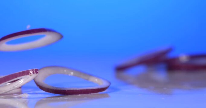 Super slow motion, Highcontrast Studio Float Purple Onion Rings