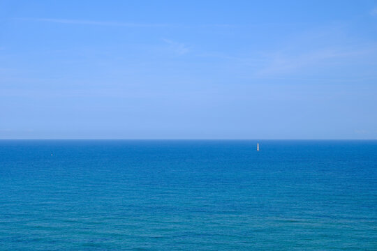 An isolated lighthouse out at sea near to the Ile De Re, La Rochell, France.