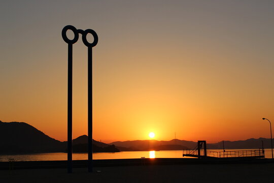 Silhouette pier and sunset over sea in Setoda Seto Inland Sea Japan