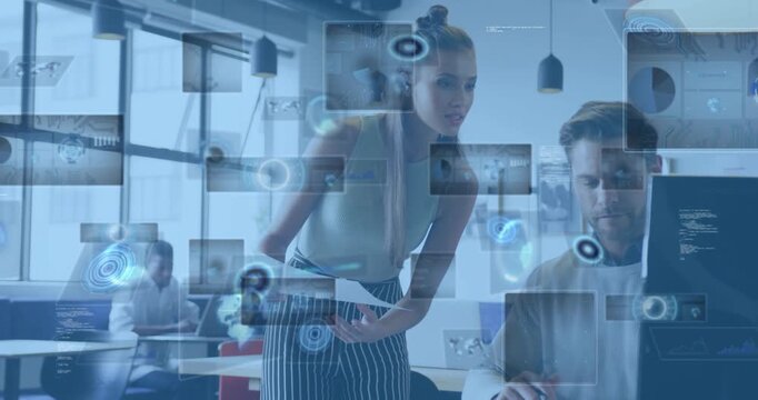 Woman appearing charts starting business review man tapping keyboard and nodes floating around desk