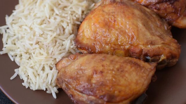 Kabsa or haneeth, an Arabic dish with rice and chicken, salt, and spices. Kabsa or haneeth as a food background for your design