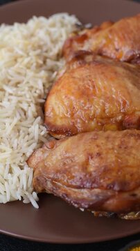 Kabsa or haneeth, an Arabic dish with rice and chicken, salt, and spices. Kabsa or haneeth as a food background for your design