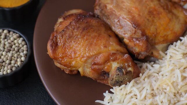 Kabsa or haneeth, an Arabic dish with rice and chicken, salt, and spices. Kabsa or haneeth as a food background for your design
