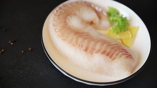 Cod fish fillet, raw fish seafood tasty snack fresh pescetarian diet gourmet food background on the table pescetarian diet rustic food top view copy space keto and paleo diets 