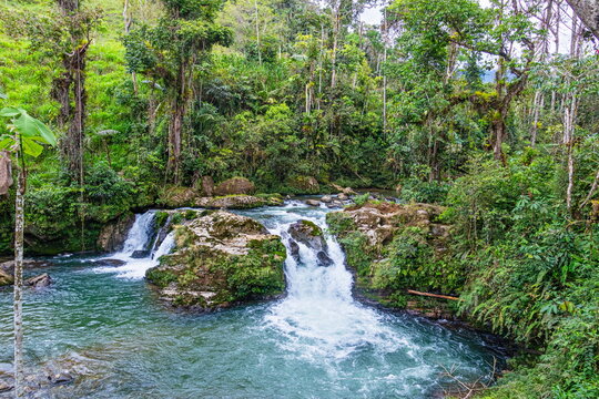 The Namancuntza Waterfall with crystal clear water and a height of 15 meters, is located in the village of Puchimi, Morona Santiago Province, Amazonia (Oriente), Ecuador.