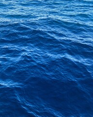 Obraz premium Blue water of the Mediterranean Sea for the background. Top view.